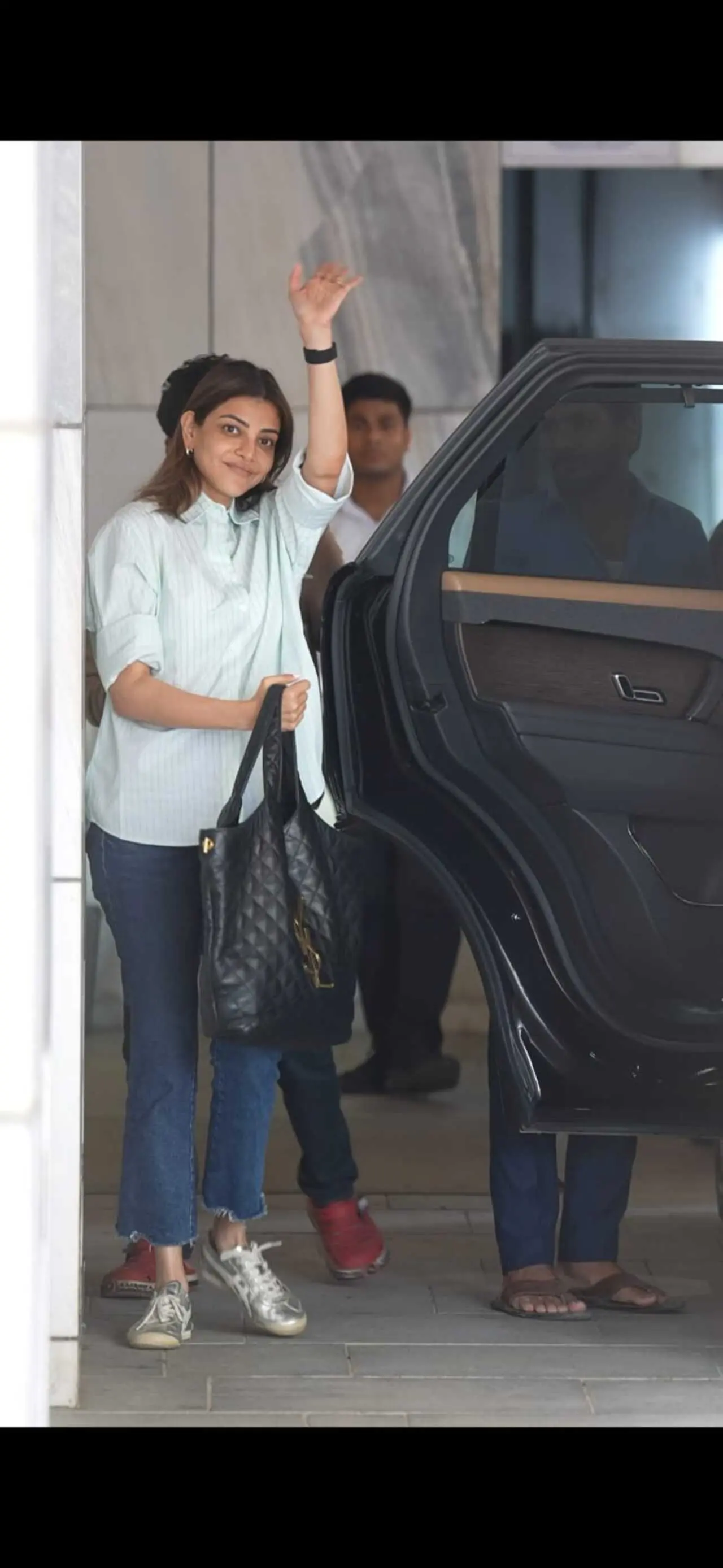 Kajal Aggarwal kept it effortlessly chic in a crisp white shirt paired with classic denims. The simple combination proves that timeless basics never go out of style.